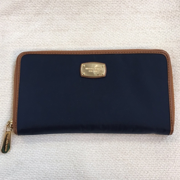 Michael Kors Handbags - MICHAEL KORS Navy wallet with leather trim. NWT!